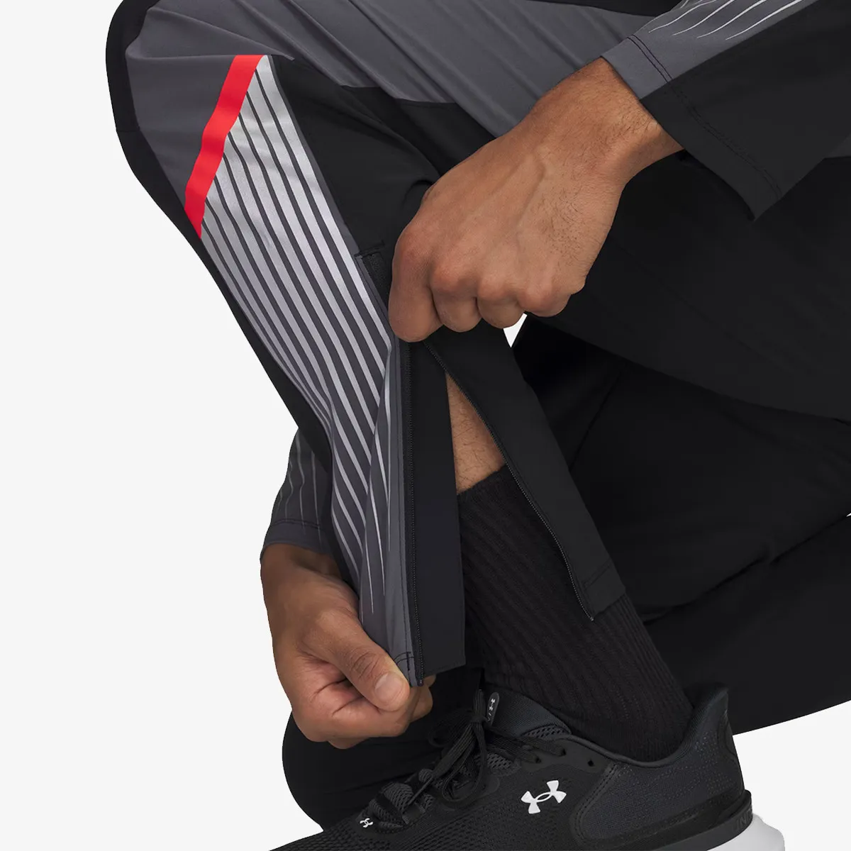 UNDER ARMOUR Donji deo trenerke Velociti Storm 