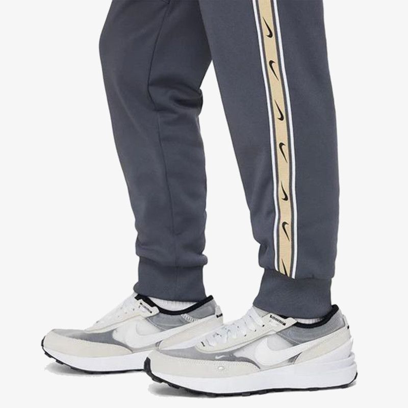 NIKE Donji deo trenerke Sportswear Repeat