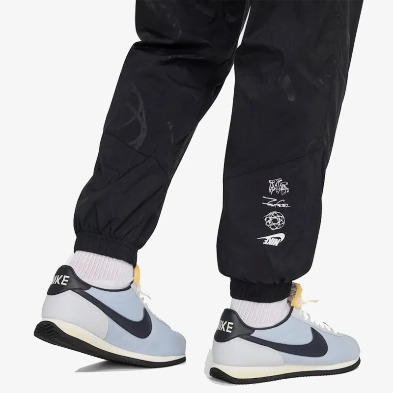 NIKE Donji deo trenerke Sportswear Breakdancing Lined Windrunner