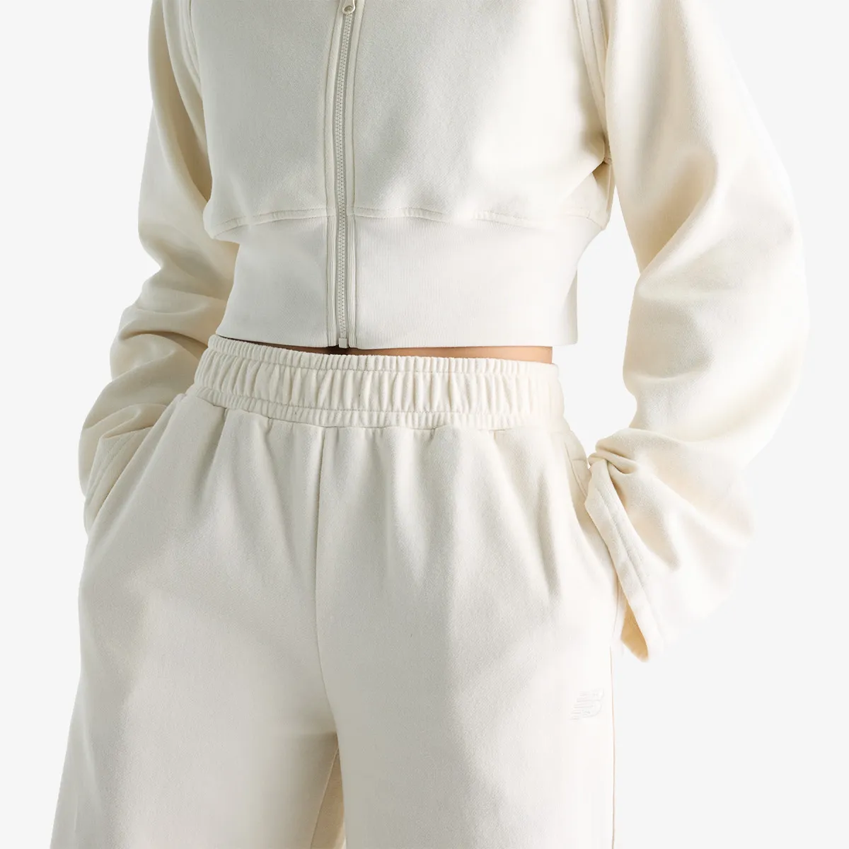 NEW BALANCE Donji deo trenerke Brushed Coastal Fleece Pant 